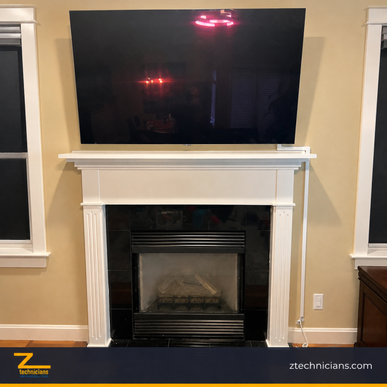 TV mounted above a fireplace between two windows in a Seattle home